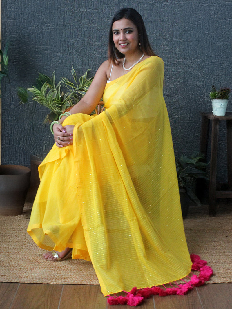 Yellow Sequinned Mul Mul Cotton Saree With Large Tassels