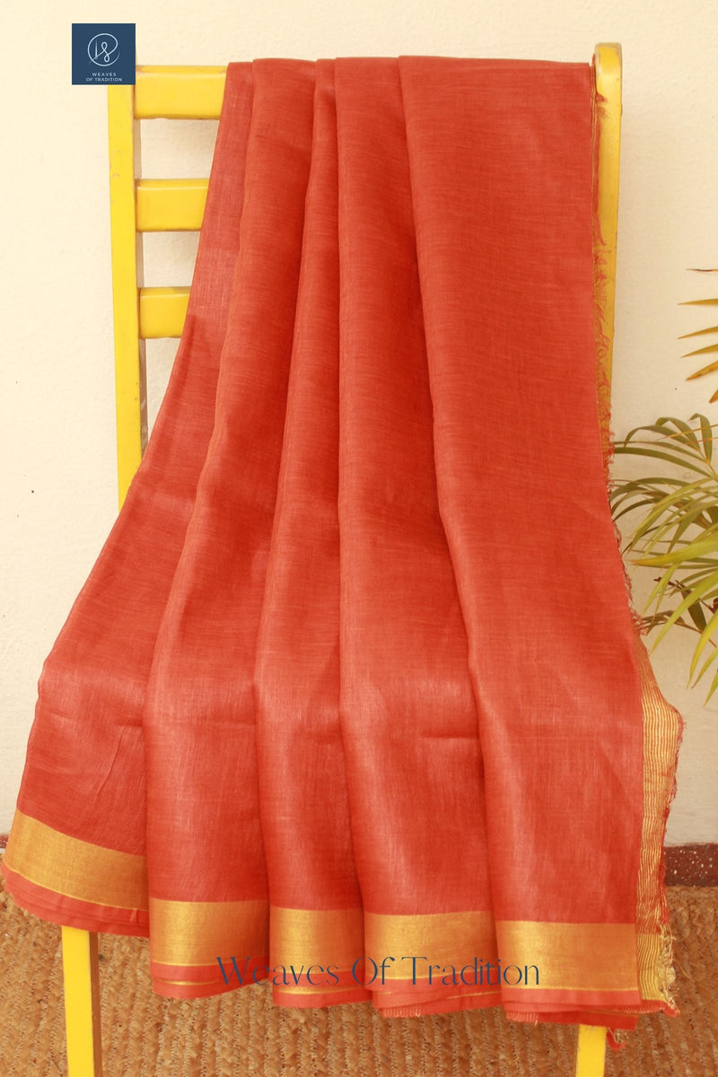 Rust Handloom Linen Saree With Zari Border